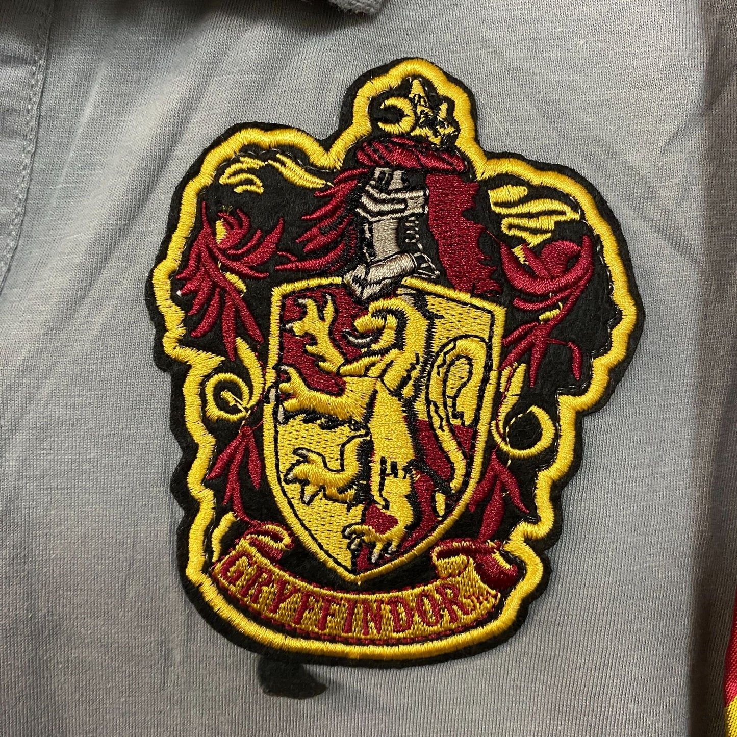 Harry Potter Juniors Gryffindor Caped Polo Shirt Large